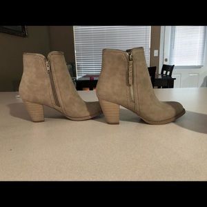 Beige booties black booties